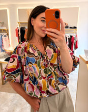 Load image into Gallery viewer, MOSAIC TIE FRONT BUBBLE HEM BLOUSE
