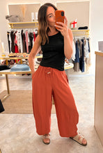 Load image into Gallery viewer, TERRACOTTA LIGHTWEIGHT BARREL LEG TROUSER
