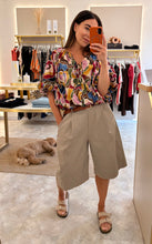 Load image into Gallery viewer, MOSAIC TIE FRONT BUBBLE HEM BLOUSE
