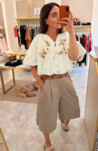 Load image into Gallery viewer, EMBROIDERED TIE FRONT BUBBLE HEM BLOUSE
