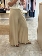 Load image into Gallery viewer, CREAM PLISSÉ PALAZZO TROUSERS
