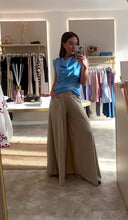 Load and play video in Gallery viewer, SKY BLUE SATIN DRAPE FRONT TOP
